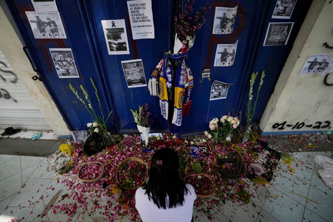 Indonesia Soccer Group: Some Gates Locked in Deadly Crush