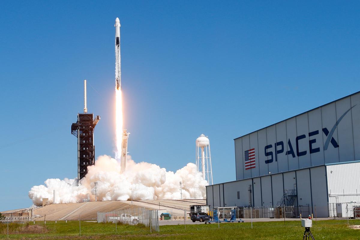 SpaceX Capsule Heads to Space Station Ferrying NASA Crew and Russian