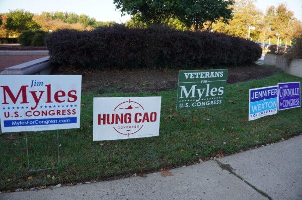 Signs outside the Fairfax County Government Center, a main early voting site, in Fairfax, Va., on Oct. 7, 2022. (Terri Wu/The Epoch Times)