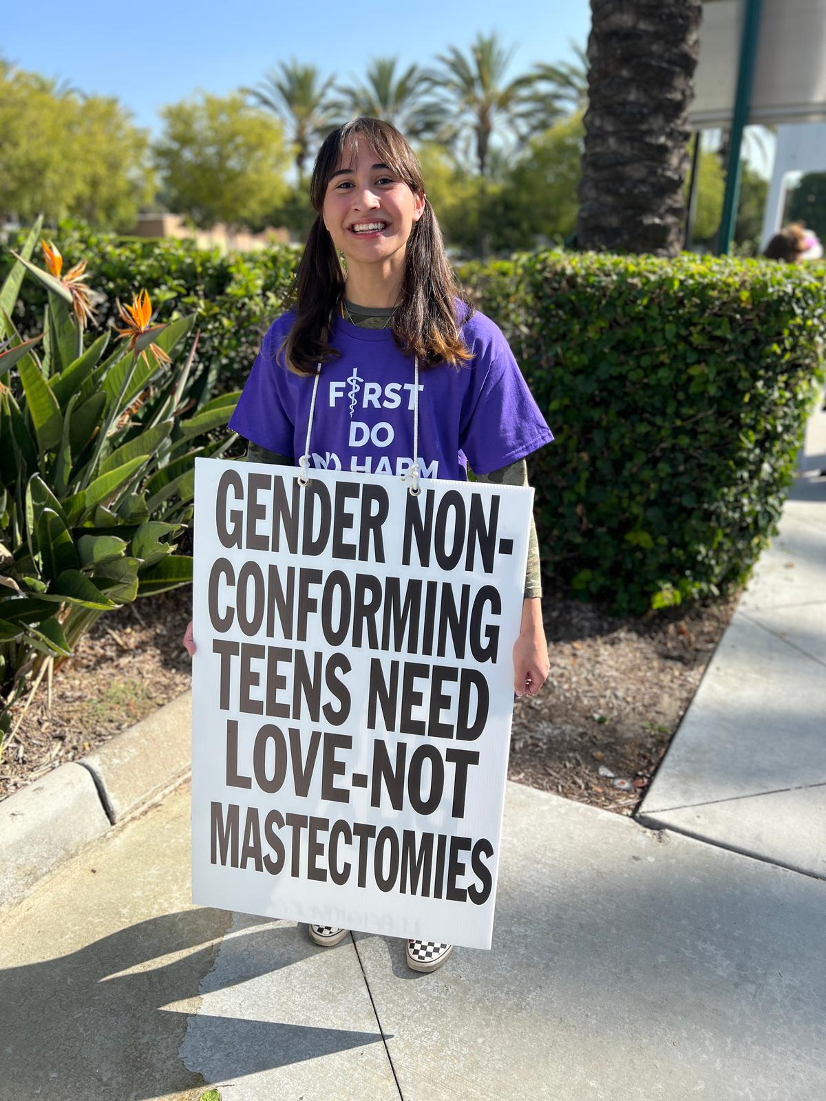 Activist Chloe Cole participates in a demonstration in Anaheim, Calif., on Oct. 8, 2022. (Brad Jones/The Epoch Times)