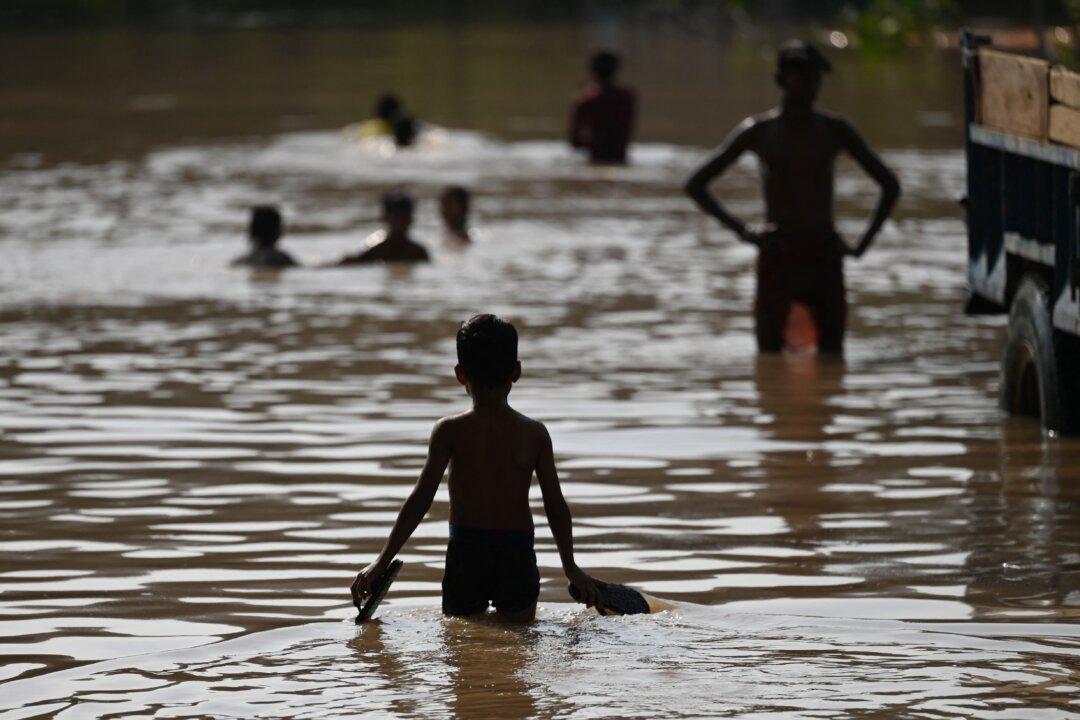 Late Monsoon Brings More Misery to North India,18 Dead