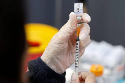 A medic prepares a dose of the Pfizer-BioNTech COVID-19 vaccine in Netanya, Israel, on Jan. 5, 2022. (Jack Guez/AFP via Getty Images)