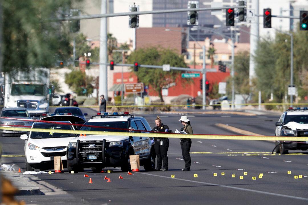 Officials: Vegas Patrol Officer Fatally Shot; Suspect Held