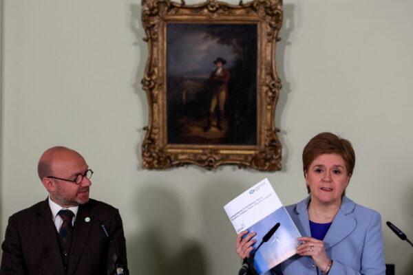 Scottish Government Minister and Scottish Green Party Co-Leader Patrick Harvie (left) and then First Minister Nicola Sturgeon speaking at a press conference in Bute House in Edinburgh, on June 14, 2022. (Russell Cheyne/PA)