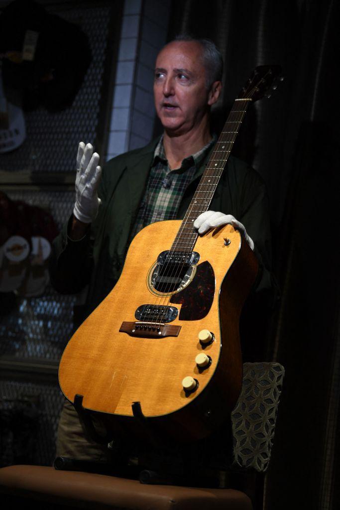 The late Kurt Cobain’s 1959 Martin D-18E sold for $6 million at auction. (DANIEL LEAL/Getty Images)
