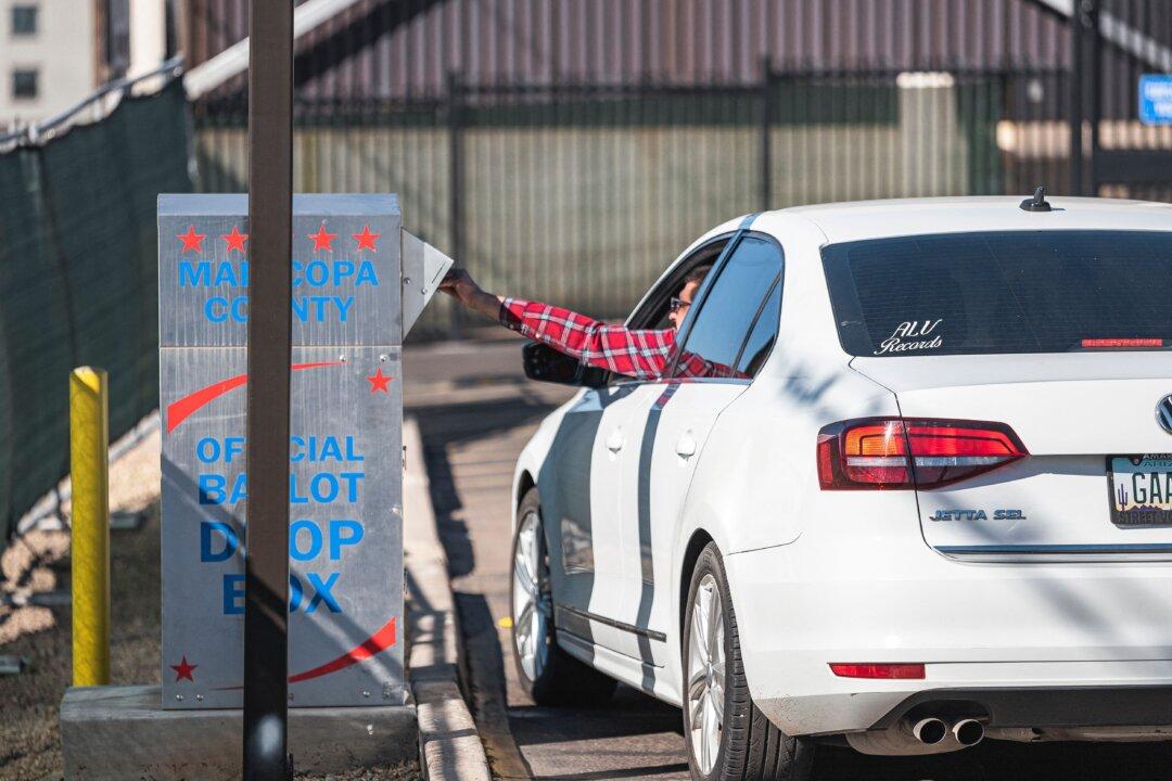 Election Watchdog Group Settles Drop Box Lawsuit in Arizona