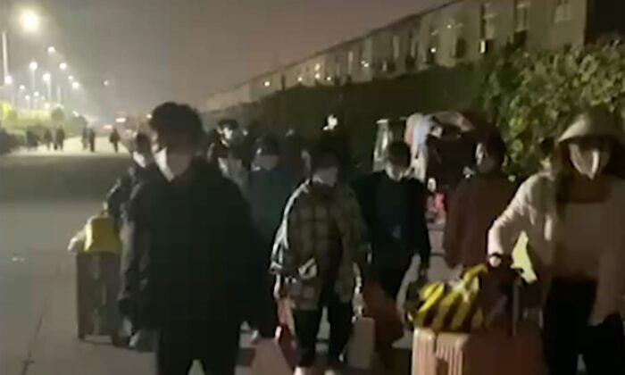 Long Walk Home: Workers Fleeing  Foxconn Are Both Impeded and Helped on Their Way