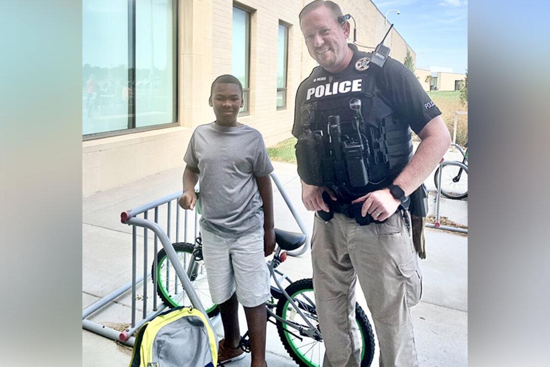 Kansas Police Officer Steps in to Help Boy Without Bicycle Who Was Getting Into Mischief on His Way to School