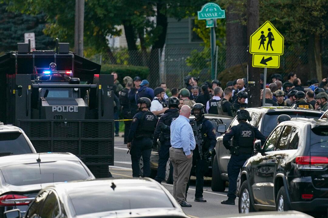 2 Police Officers Shot in Newark; Suspect at Large