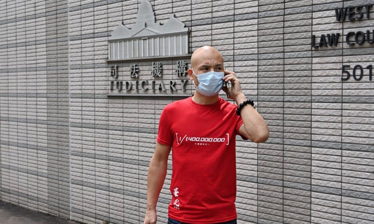On October 31, 2022, the defendant Hu Aimin outside the West Kowloon Magistrates' Court in Hong Kong. In December 2020, he repeatedly destroyed the Falun Gong truth clarification sites and was charged with 5 counts of "criminal damage." (Sung Pi-Lung/The Epoch Times)