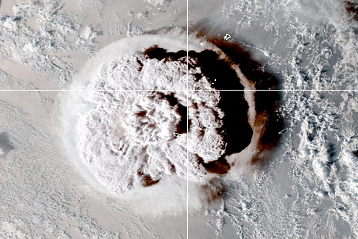 The eruption of an underwater volcano off Tonga, which triggered a tsunami warning for several South Pacific island nations, in an image from the NOAA GOES-West satellite taken at 1:00 a.m. ET on Jan. 15, 2022. (CIRA/NOAA/Handout via Reuters)