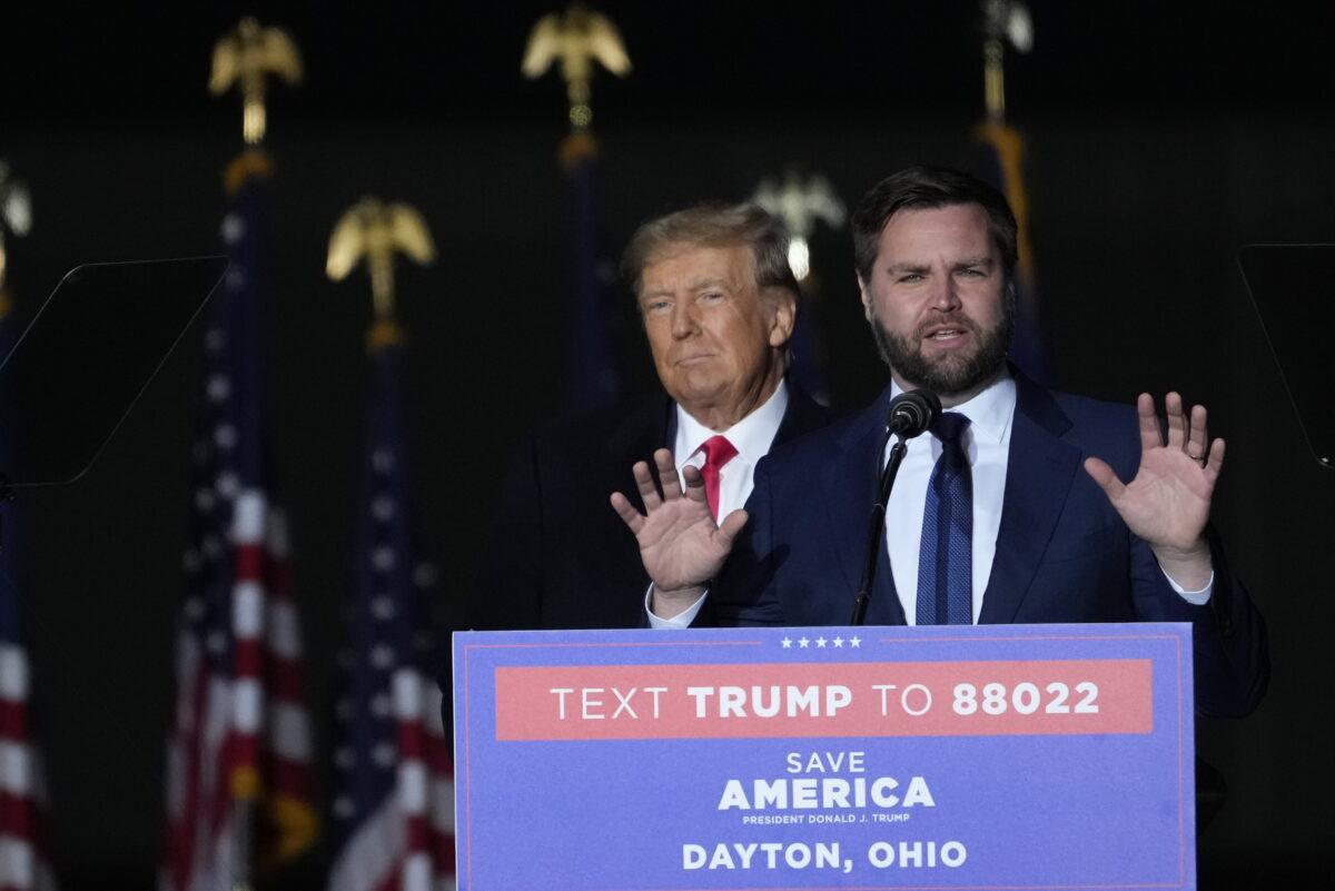 Former President Donald Trump and Republican candidate for U.S. Senate J.D. Vance during a rally at the Dayton International Airport in Vandalia, Ohio, on Nov. 7, 2022. (Angerer/Getty Images)