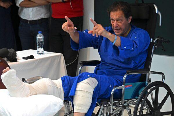 Pakistan's former Prime Minister Imran Khan addresses the media representatives at a hospital a day after an assassination attempt on him, in Lahore, Pakistan, on Nov. 4, 2022. (Arif Ali/AFP via Getty Images)