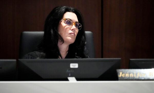 Waukesha County Circuit Court Judge Jennifer Dorow listens as Darrell Brooks gives his closing remarks during his sentencing in a Waukesha County Circuit Court in Waukesha, Wis., on Nov. 16, 2022. (Mike De Sisti/Milwaukee Journal-Sentinel via AP, Pool)