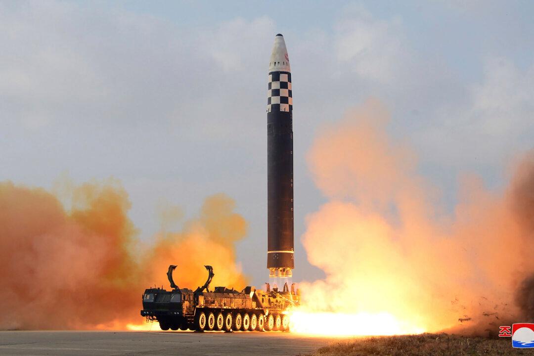 Kim Jong-un Unveils His Daughter During Ballistic Missile Launch