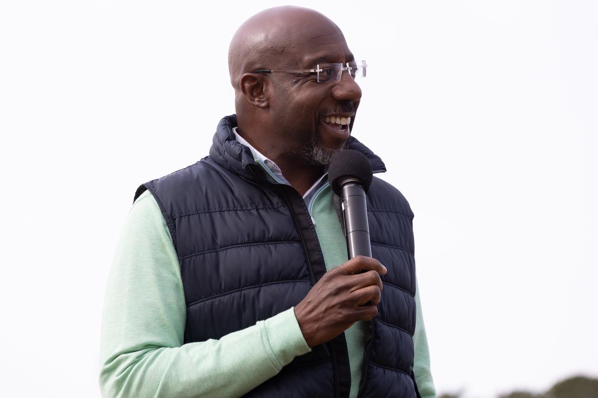 Warnock Stumps in Walker’s Hometown