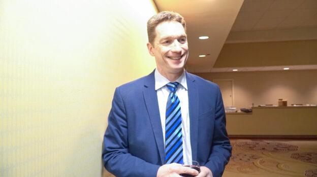 Chris Parker, a credit officer in an insurance company, at the 40th annual Stand Up For Life dinner in Philadelphia, Nov. 20, 2022. (May Lin/The Epoch Times)