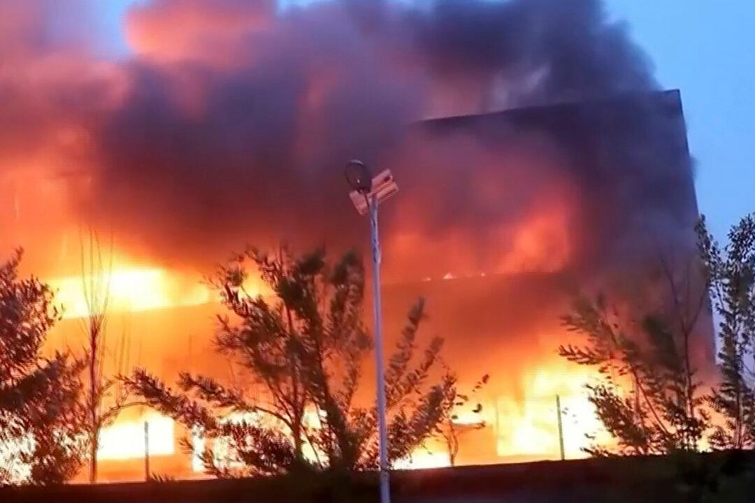 China Trading Company Fire Kills at Least 38, 4 Detained