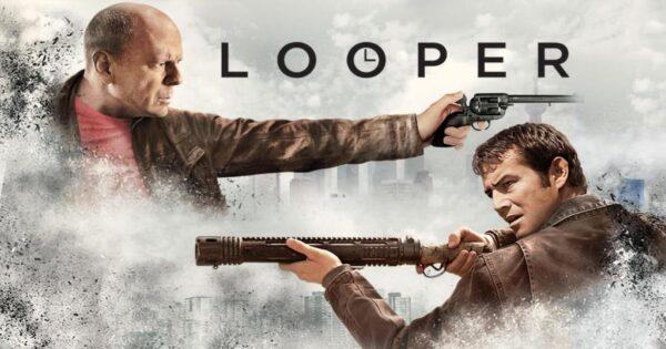 Old Joe (Bruce Willis, L) and Joe (Joseph Gordon-Levitt) play the same character in the time-travel film, "Looper." (Tri-Star Pictures)