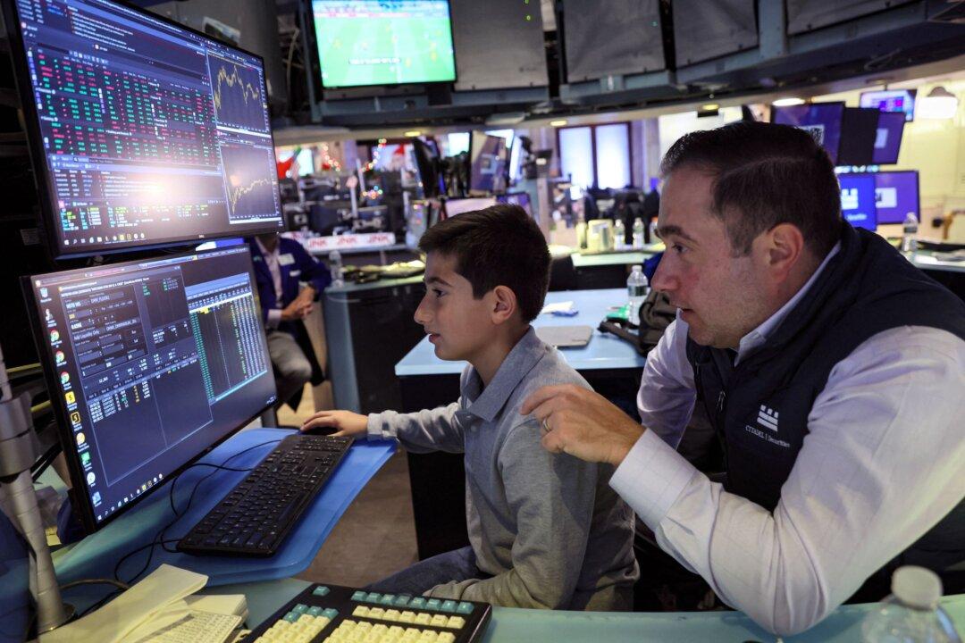 Nasdaq Opens Higher; Tesla Leads Gains in Growth Stocks