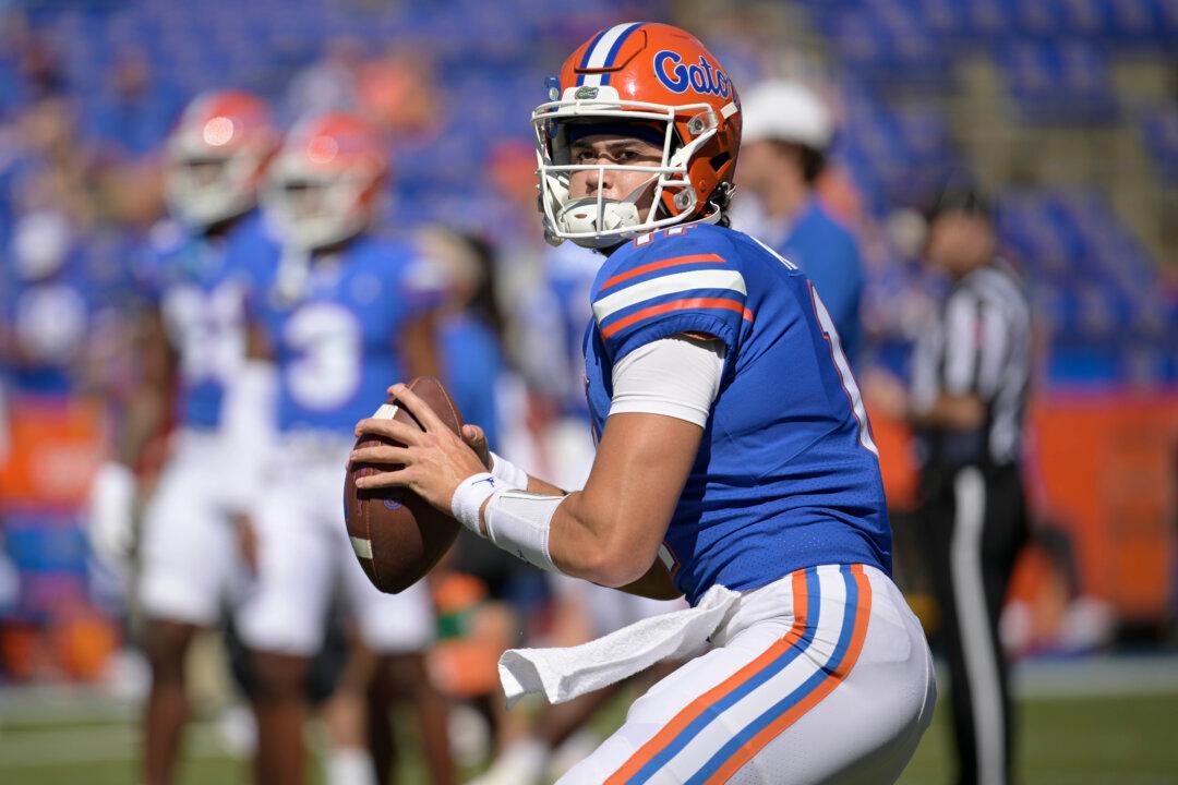 Florida Quarterback Kitna Leaves Jail as Child Porn Details Emerge