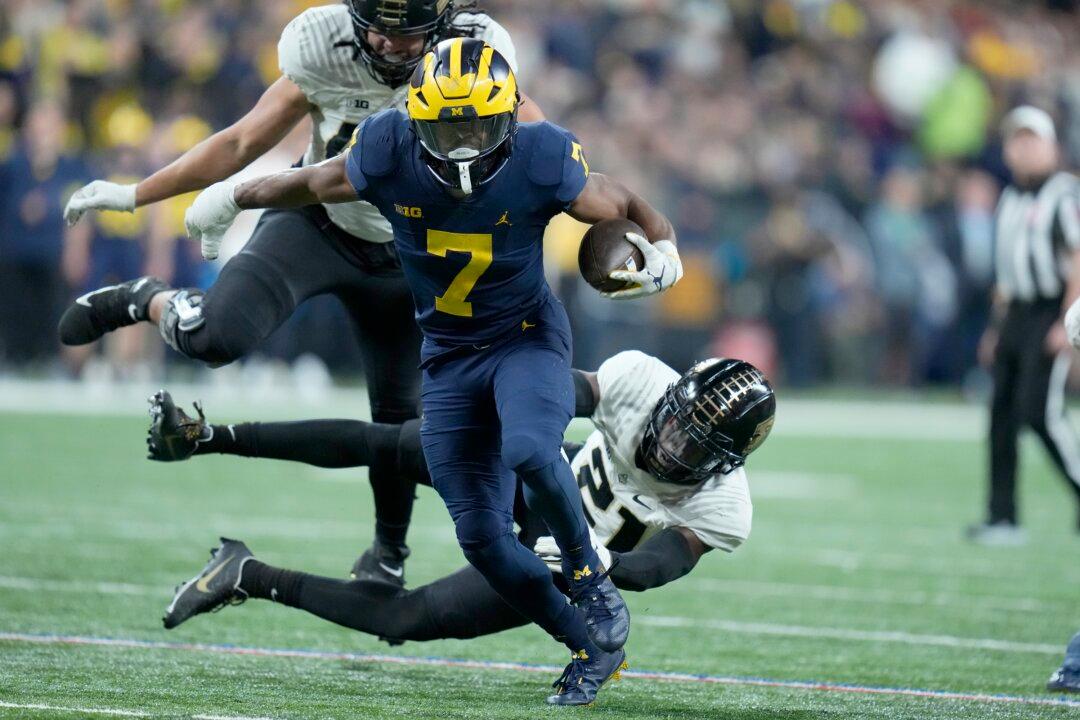 No. 2 Michigan Beats Purdue 43–22 for Big Ten Crown