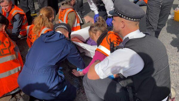 An undated image of police officers dealing with a Just Stop Oil sit-down protest in central London. (Metropolitan Police)