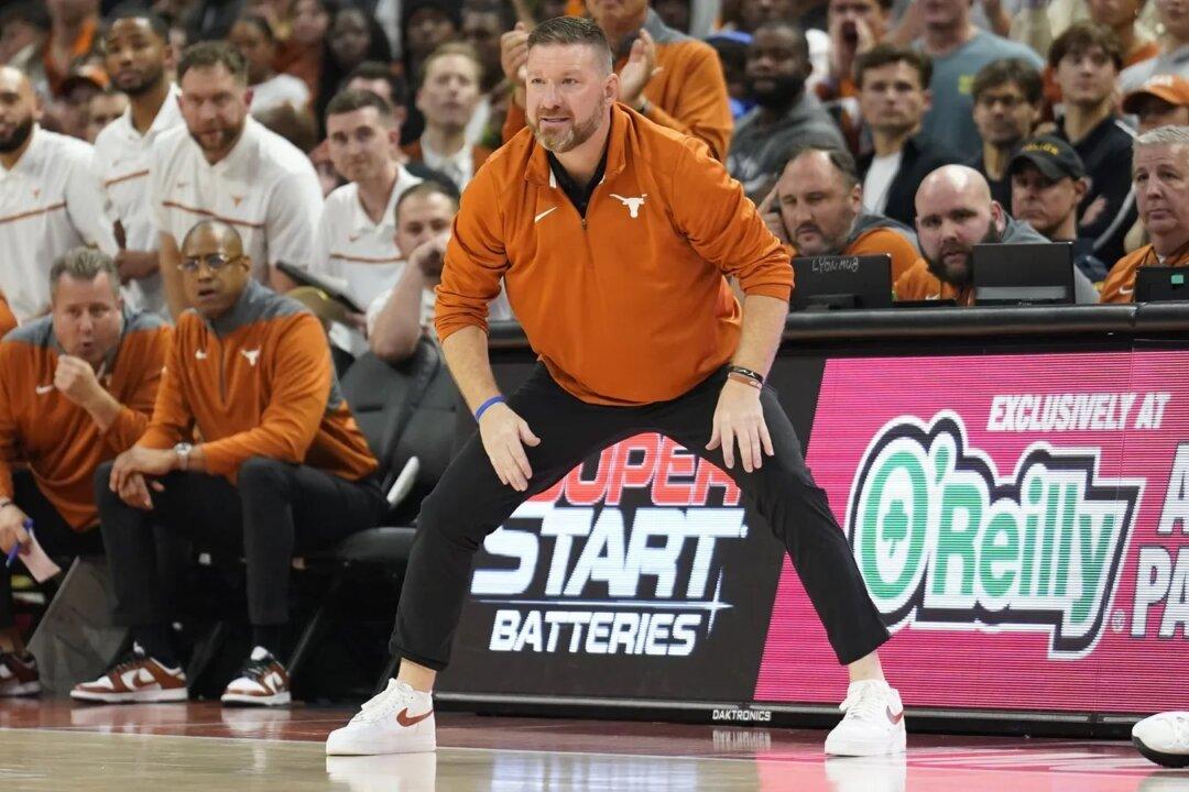 Texas Suspends Coach Chris Beard Over Family Violence Charge
