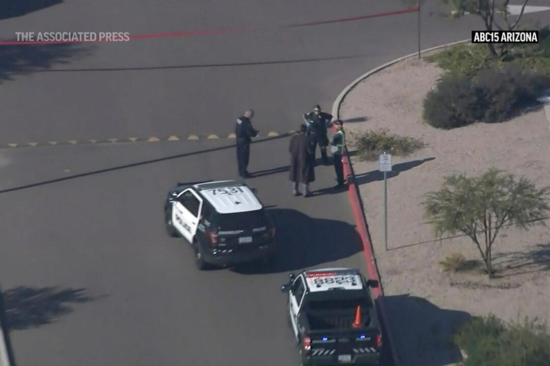 Police: Suspect Shot Worker at Amazon Hub, Then Is Shot Dead