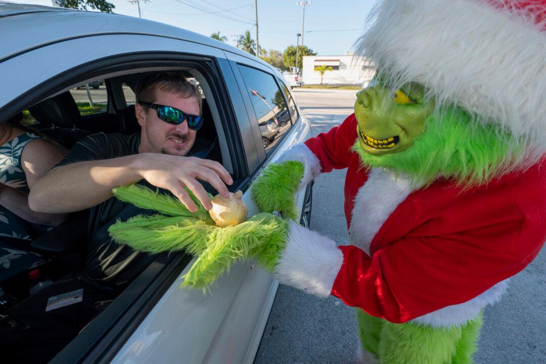 Deputy Dressed as Grinch Gives Onions to Speeding Drivers