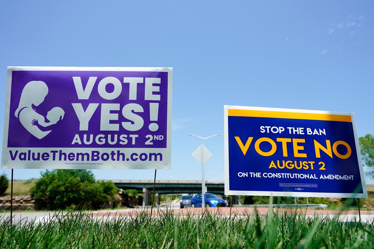 News Brief: Kansas Supreme Court Strikes Down Abortion Regulations, 140 Million Americans Under Heat Alerts, and Warning Issued to iPhone Users