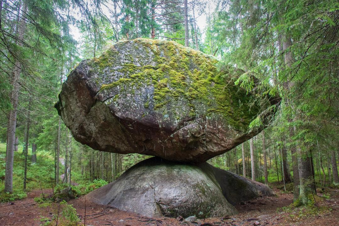 Finland’s 500-Ton Kummakivi Rock Has Been Balancing on Top of Another Rock for 11,000 Years