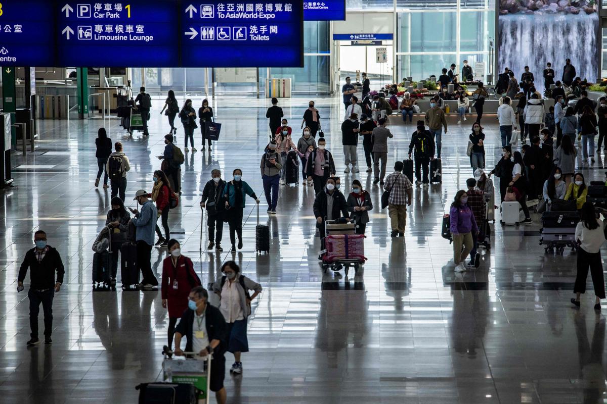 Amid Surge in COVID-19 Cases, China Lifts Quarantine Rules for International Travel