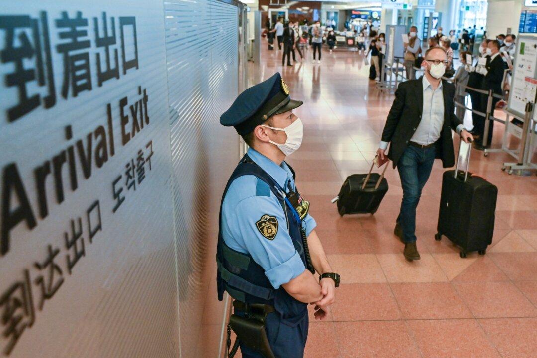 Japan Tightens Border Controls for Travelers From COVID-Hit China as Accurate Virus Data Obscured