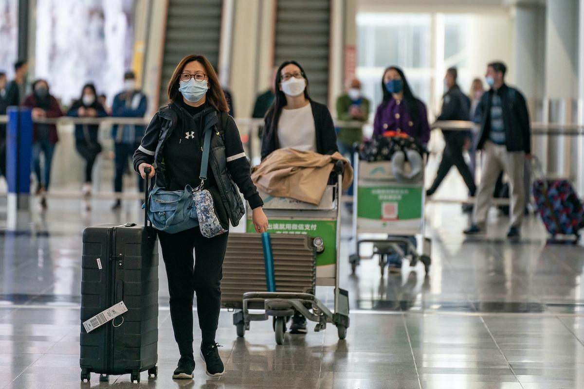 China Deliberately Pushing Citizens to Get COVID-19 to Reach Herd Immunity: Expert