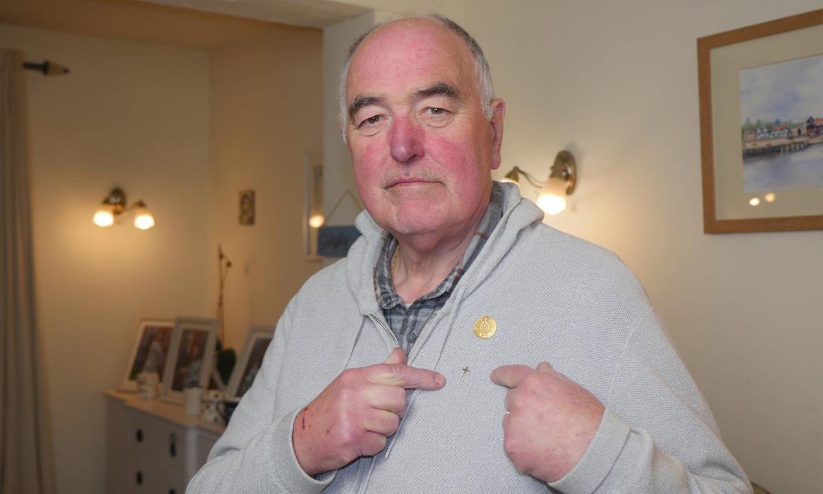 Chaplain Who Was Told to Remove Half-Inch Cross Pin or Face Consequences Remains Firm to His Faith