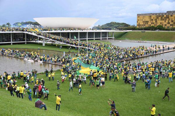 Supporters of Brazilian former President Jair Bolsonaro hold a demonstration at the Esplanada dos Ministerios in Brasilia on Jan. 8, 2023. (Evaristo Sa/AFP via Getty Images)