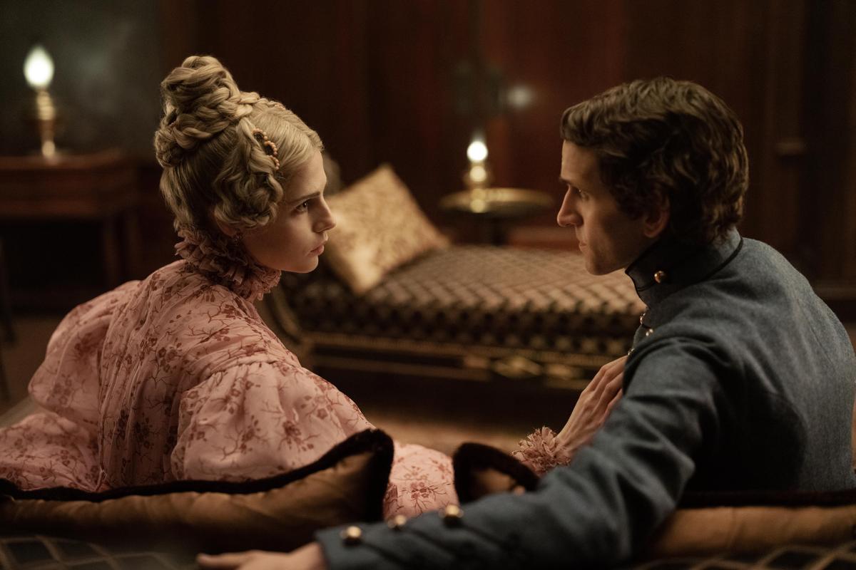 Lea Marquis (Lucy Boynton) with Cadet Edgar Allan Poe (Harry Melling), in "The Pale Blue Eye." (Scott Garfield/Netflix)