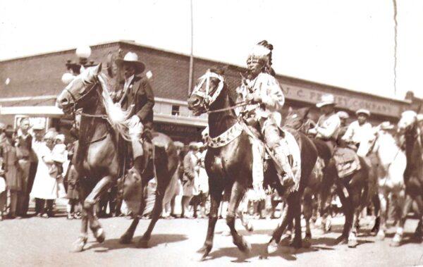 Haines (L) and a Pawnee chief on horseback during a parade, circa 1920s. (Courtesy of J.D. Haines)