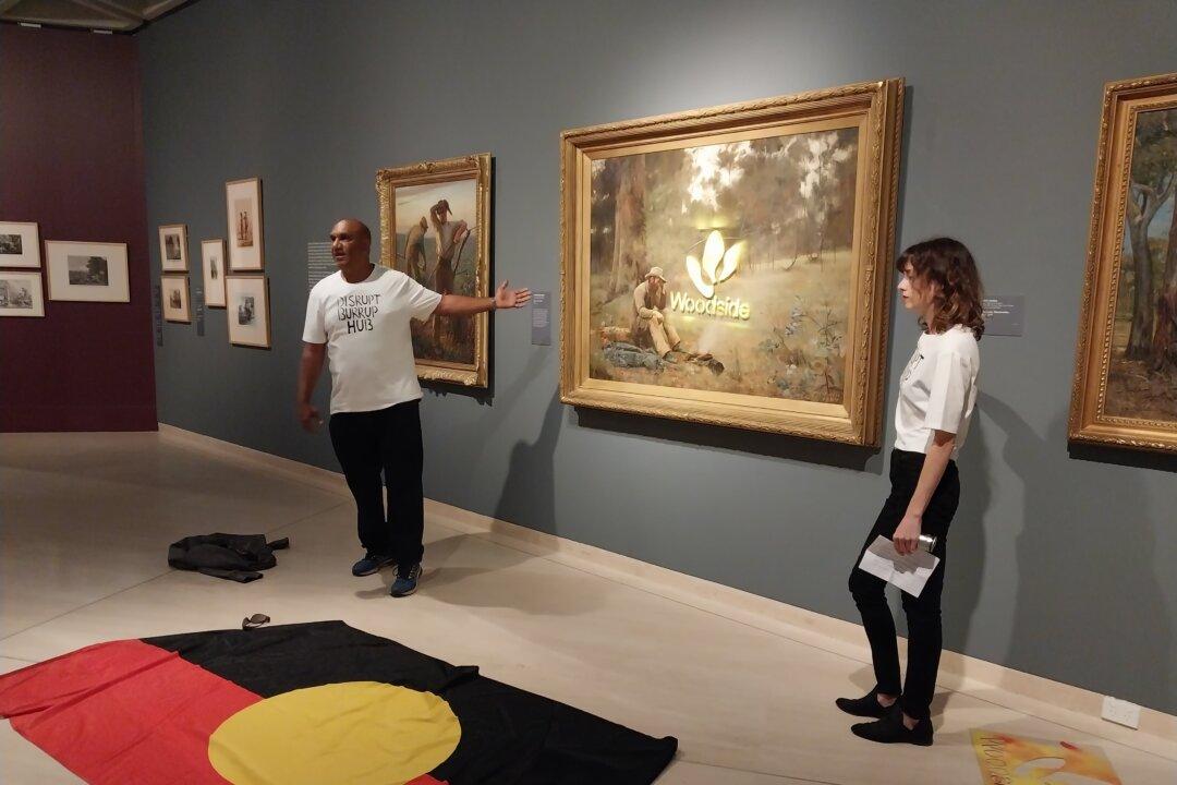 Artist Who Defaced Painting Says Police Raided Her Home