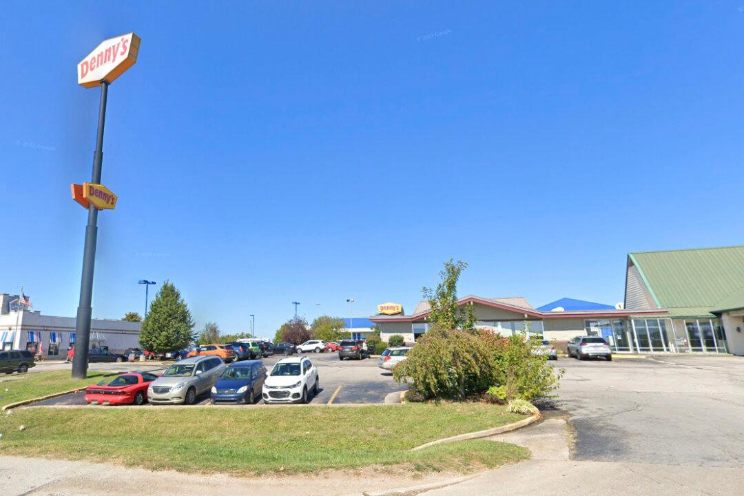 Restaurant Sign Topples in High Wind; 1 Dead, 2 Injured