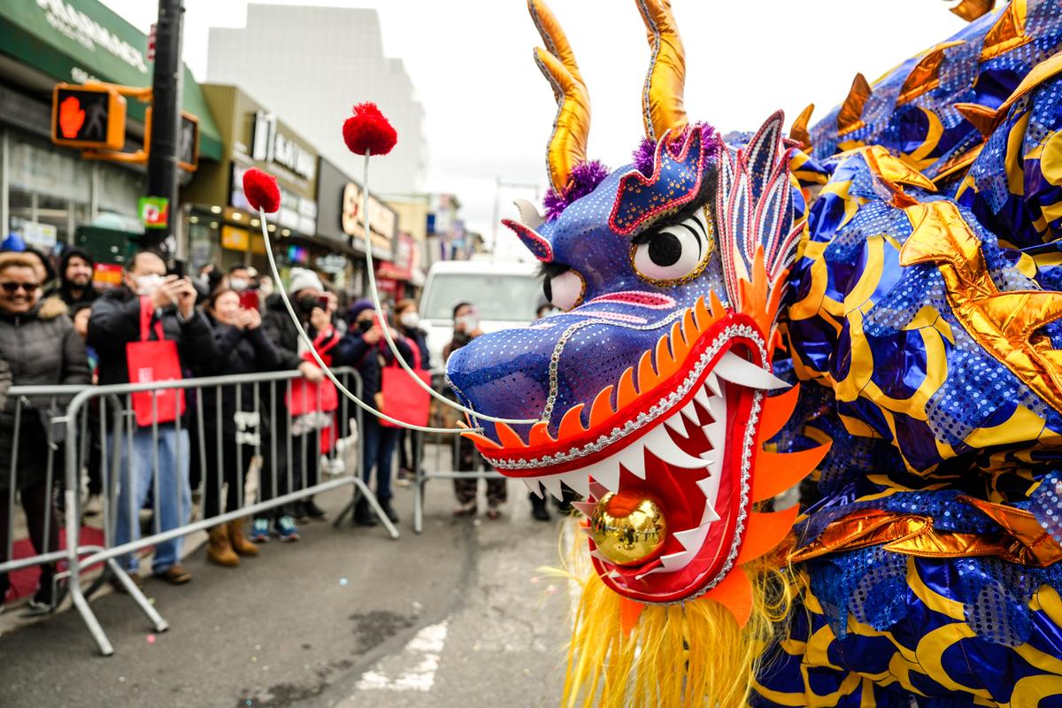 Falun Gong practitioners participate in the Chinese New Year Parade in Flushing, N.Y., on Jan. 21, 2023. (Samira Bouaou/The Epoch Times)