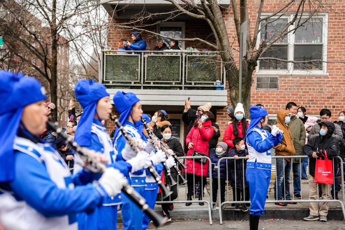 Falun Gong practitioners participate in the Chinese New Year Parade in Flushing, N.Y., on Jan. 21, 2023. (Samira Bouaou/The Epoch Times)