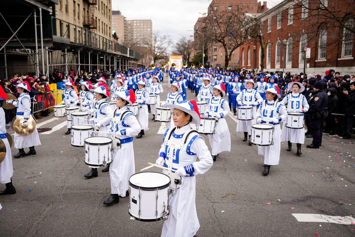 Falun Gong practitioners participate in the Chinese New Year Parade in Flushing, N.Y., on Jan. 21, 2023. (Samira Bouaou/The Epoch Times)