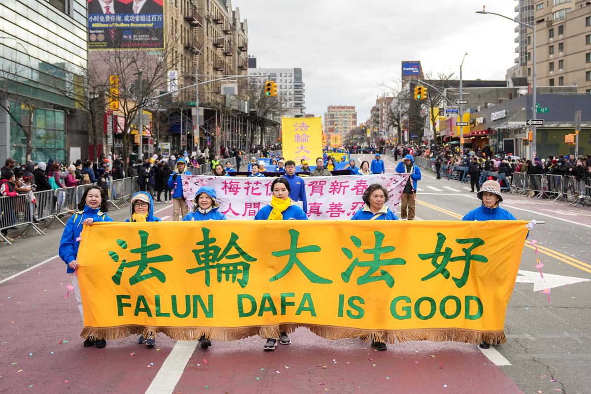 Falun Gong practitioners participate in the Chinese New Year Parade in Flushing, N.Y., on Jan. 21, 2023. (Samira Bouaou/The Epoch Times)