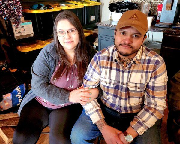 U.S. Army veteran Romel Armendariz of Williams, Ariz., talks about the effects of having Post Traumatic Stress Disorder with his wife, Elaina Galvan, at Operation: Transition Outside the Wire on Jan. 16. 2023. (Allan Stein/The Epoch Times)