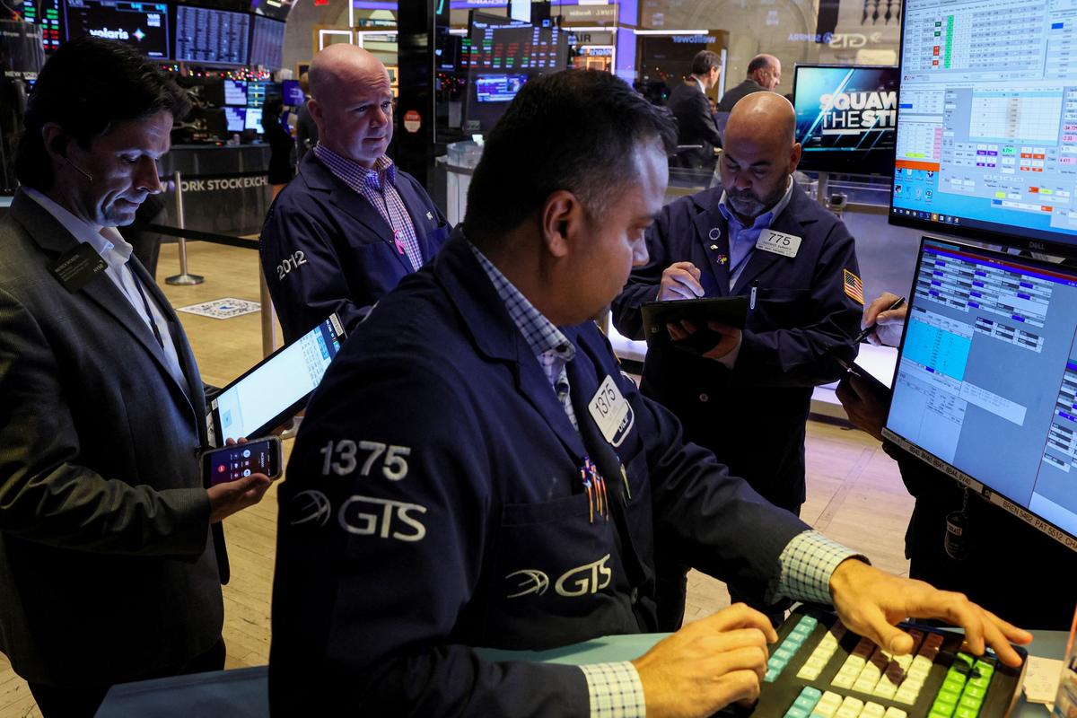 Wall Street Opens Lower as Earnings Roll In, Chipmakers Retreat
