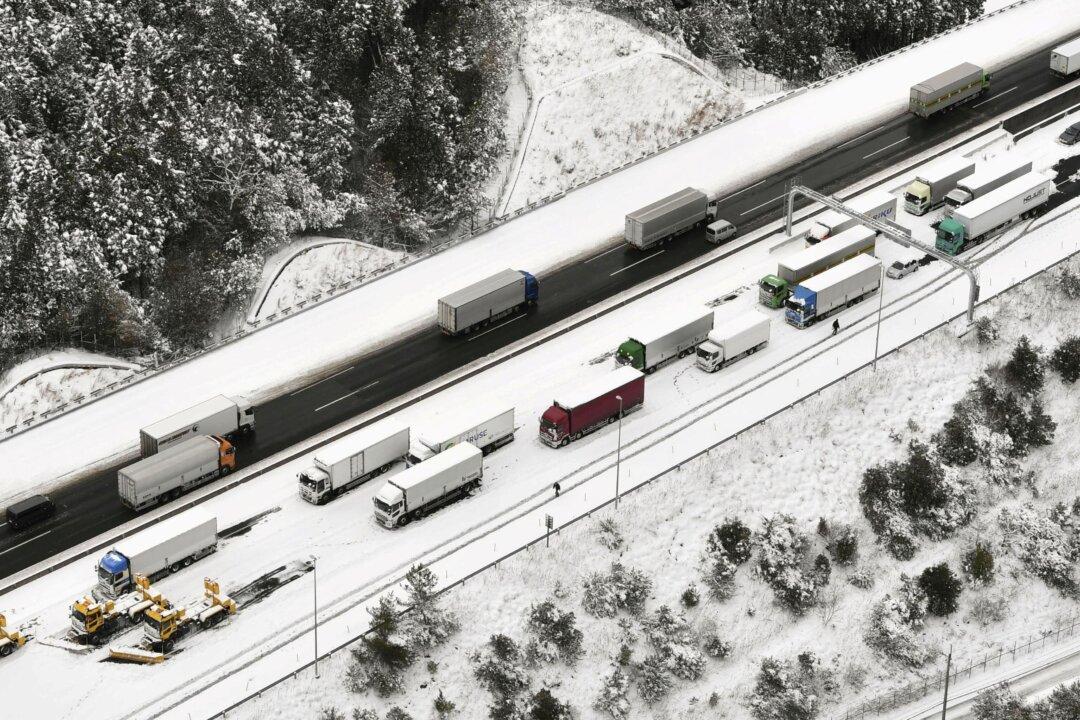 Heavy Snow Causes Havoc in Japan as Cold Snap Sweeps Through Asia