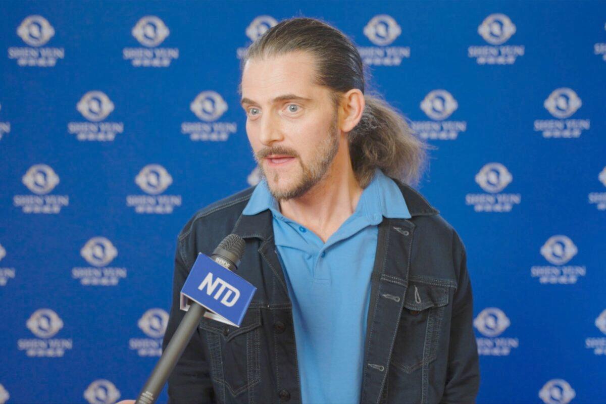 Dragan Ilin enjoys Shen Yun Performing Arts at Place des Arts in Montreal on Feb. 3, 2023. (NTD)