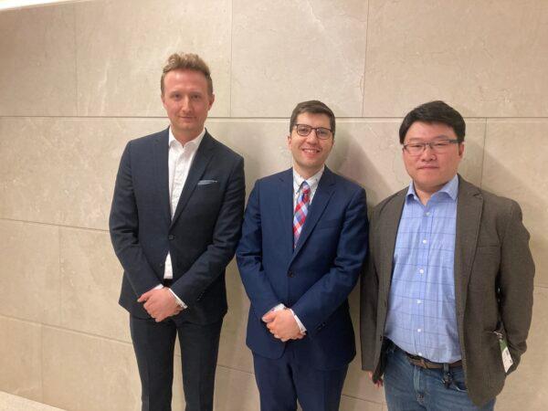 (L-R) Award-winning filmmaker Jason Loftus poses with Conservative MP Garnett Genuis and animation artist Daxiong at a screening of "Eternal Spring" on Parliament Hill on Feb. 13, 2023. (The Epoch Times)